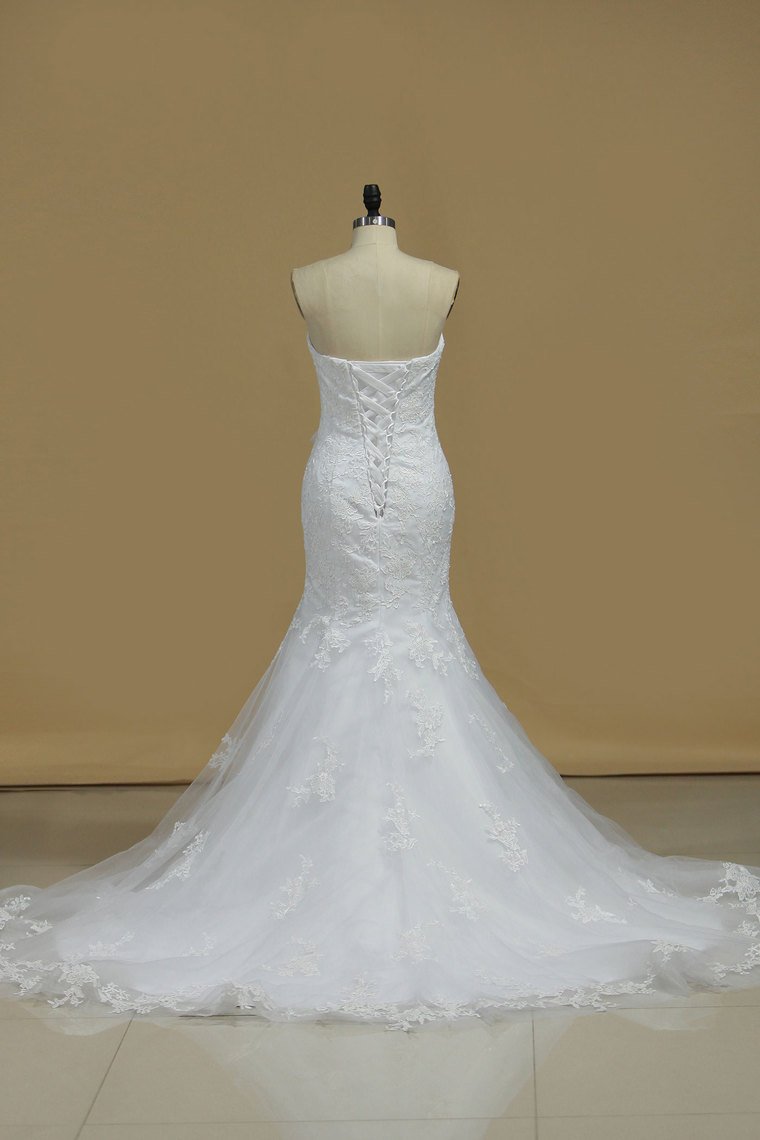 2024 Strapless Mermaid/Trumpet Wedding Dress With Applique Organza Chapel Train