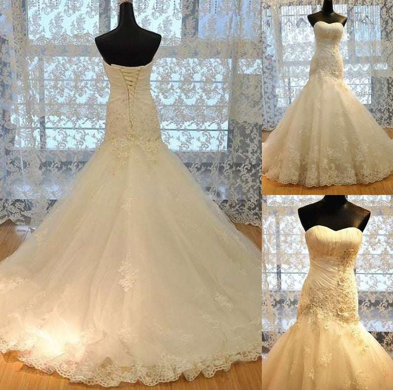 Tulle Sweetheart Applique Court Trumpet/Mermaid Sleeveless Train Wedding Dresses